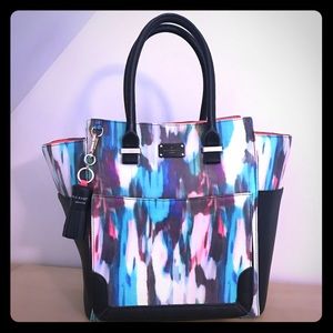 Paul’s Boutique artsy vegan leather top handle bag